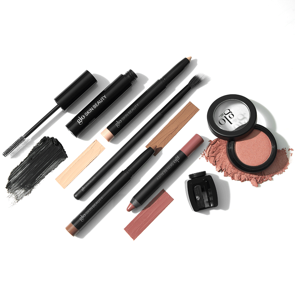Makeup kit with glo SKIN BEAUTY mascara, pencils, blush, sharpener, and color swatches